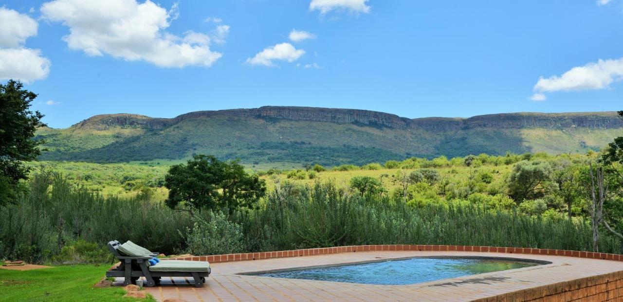 African Hills Safari Lodge & Spa Магалисбург Экстерьер фото