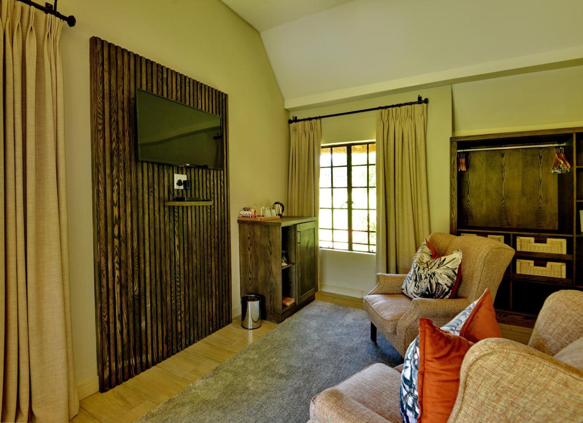 African Hills Safari Lodge & Spa Магалисбург Номер фото