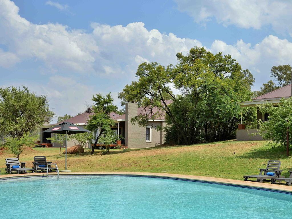 African Hills Safari Lodge & Spa Магалисбург Экстерьер фото